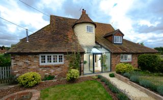 Small glass link extension to old house