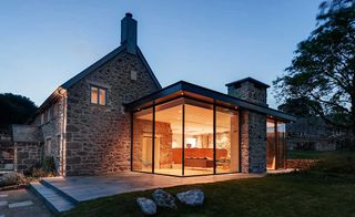 glass box extension to 17th century farmhouse