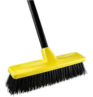 yellow and black patio brush